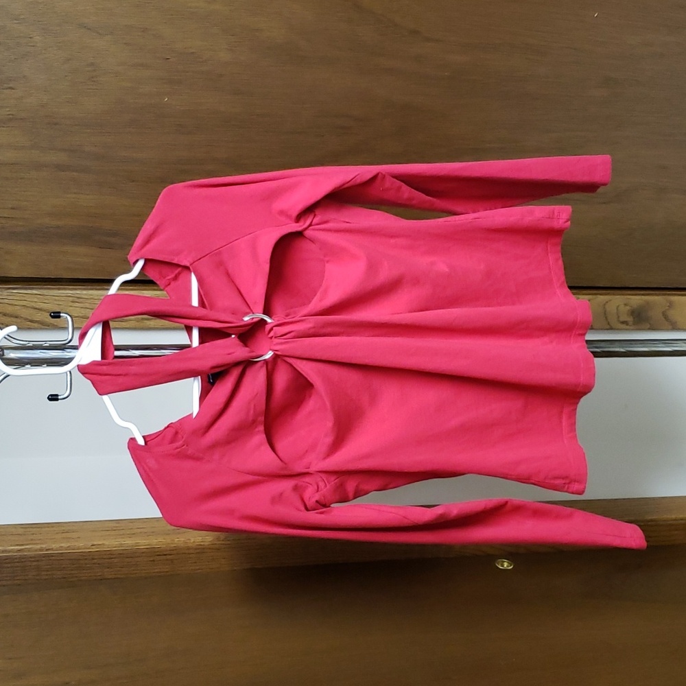 Red halter top style long sleeved top with silver hoop decor.Bin#7